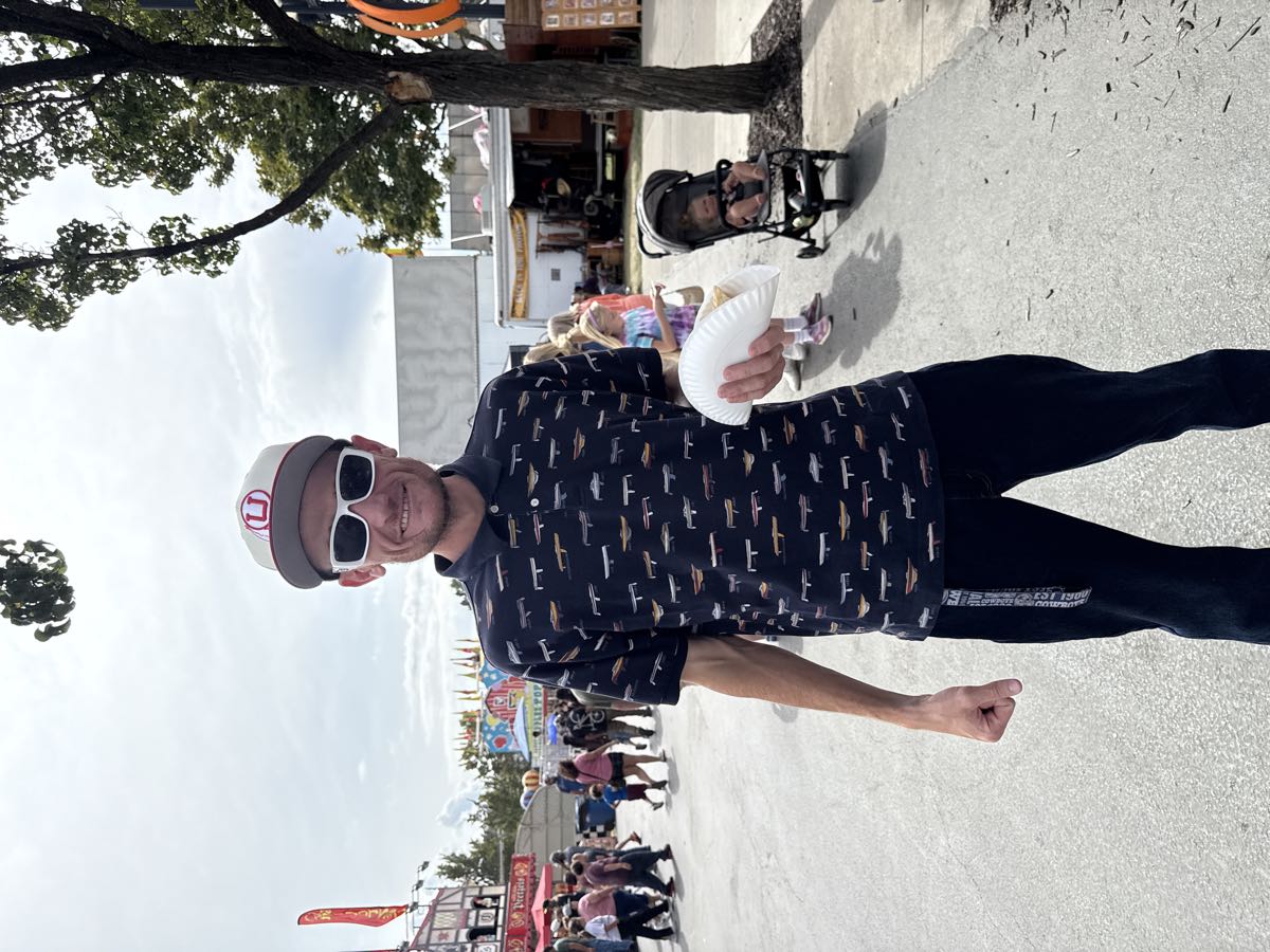 Client enjoying carnival food